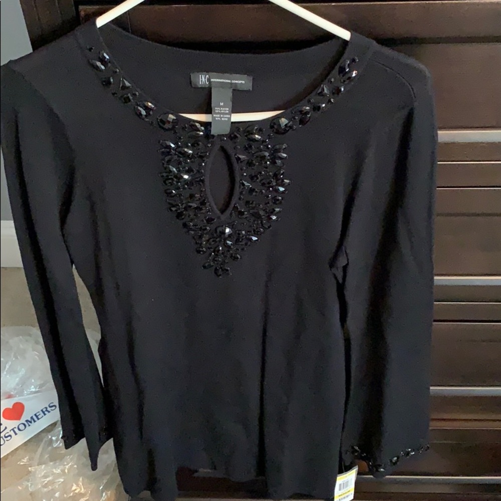 Black INc shirt